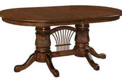 Oval Fluted double pedestal table with the wheat stretcher bar.