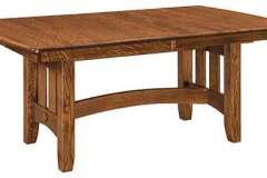 The Galena trestle table in Quarter Sawn Oak wood. It is available in several sizes and woods.