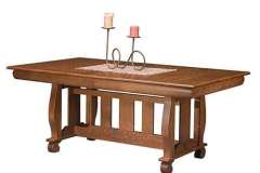 Mission style custom Hampton Trestle table. Shown in Quarter Sawn Oak wood.