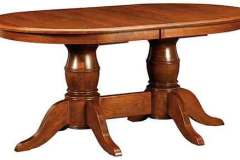 This is showing our Amish Harrison table with a double pedestal in Cherry wood.