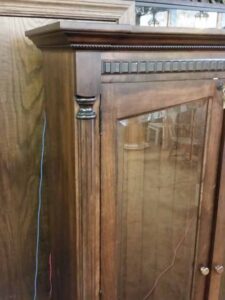 Detail of Amish Craftsmanship on Upper Cabinet Fluted Columns, Dentil Molding, and Fancy Top.