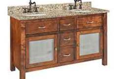 What you see here is our 3 drawer and 2 door, double sink vanity. This is Amish built and can be done with our counter top or one of your own choosing.