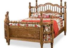 Wrap Around Custom Made Amish Bed shown in red oak with turned spindles headboard