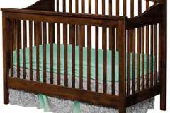 The custom Hampton crib has a routed, arched top molding, a curved top end molding, and solid wood slats, and all with a formaldehyde free finish.