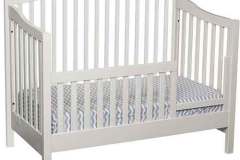 The Amish crafted Hampton baby crib can be converted into a stylish day bed.  The guard rail in front comes with it but you don't have to use it if you don't want to.