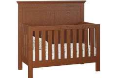 Haven style convertible crib that is Amish crafted is shown here in Quarter Sawn Oak wood with Michael's Cherry stain. The convertible cribs offer a way to utilize you piece of furniture through all stages of life.