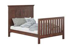 Amish Made Haven crib converted to a double bed in Sap cherry wood with Asbury stain.