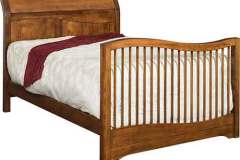 The Tannessah crib seen here is converted to a full size bed. The process to change the bed is very simple and the bed can be made in all of the standard sizes.