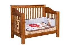 Here is our Mission Slat crib converted to a toddler bed. The conversion process is very simple and you are supplied all of the necessary nuts, bolts, screws, and tools you need to do this.