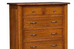 Amish made West Lake six drawer bedroom chest crafted out of solid quarter sawn white oak.  This piece is shown stained with a Michaels Cherry stain finish.