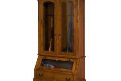 Amish made Breckenridge Two door gun cabinet.  Shown crafted with beveled glass, lower lighted pistol display, and full extension drawer with dovetailed construction.