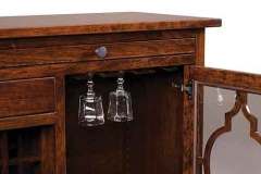 Your wine glasses hang upside down in the top of this Bellamy Wine Cabinet custom made by the Amish.