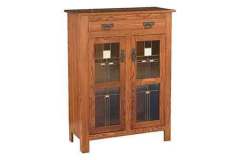 Here is an Amish made custom designed pie safe that has 2 doors with leaded glass inserts and 1 full width drawer.