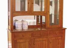 Custom Amish built curved Shaker hutch. This is shown with a mirrored back and beveled glass.