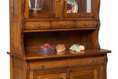 The Frontier Hutch is highlighted here. The elegant look of the curved wood is special.