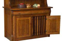 Custom Amish built Frontier storage buffet. It also has a suitable serving top.