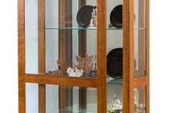 This is the large Leda custom Amish curio. It has 4 shelves with a mirrored back and lights.