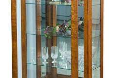 One sliding door is all that is needed for this Leda medium curio cabinet. It is shown with 3 glass shelves and a mirrored back.