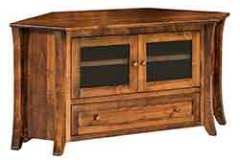 This is a walnut corner tv cabinet shown with a natural finish. It is beautifully designed with curved legs and wood hardware.