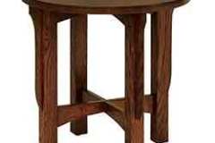 This is an Oak 22" round custom designed end table.