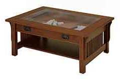 This Amish built glass top coffee table is available in several sizes. The glass top is removable.