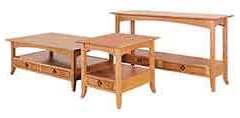 The sofa table, end table, and coffee table on made in the Shaker Hill style by the Amish.