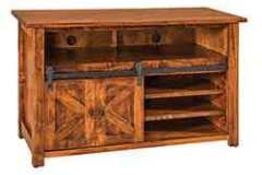 This shows the one door version of the barn door tv cabinet. It is 49" wide.