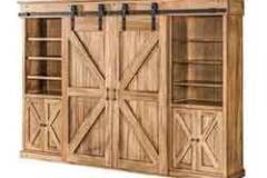 This is showing the barn door unit with the door closed to expose the side towers. A lot of shelf and storage space is available with this.