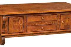 Drawers and doors highlight the Hampton coffee cabinet table. The two drawers and two doors make for ample storage spaces.