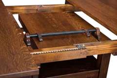 Here you are seeing the butterfly leaf in our custom Kenwood pub table. It has a cabinet base.