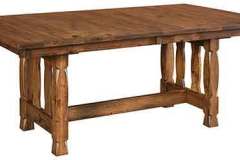 The Rock Island dining table is Amish built in either a solid top or with leaves. You select what you need.