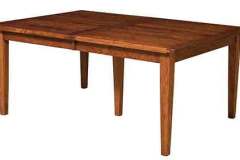 Our Jacoby table is shown here with Shaker legs. Custom Amish craftsman at its finest.