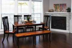 Amish crafted Newberry Leg table. Shown in two tone colors with the bench and chairs.